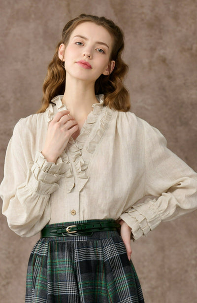 Angie 33 | Ruffled linen blouse in beige