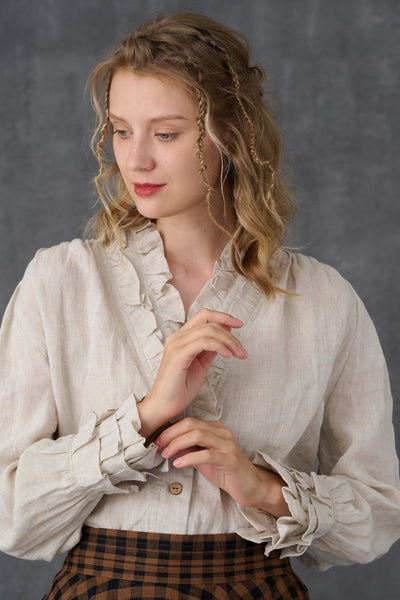 Angie 33 | Ruffled linen blouse in olive