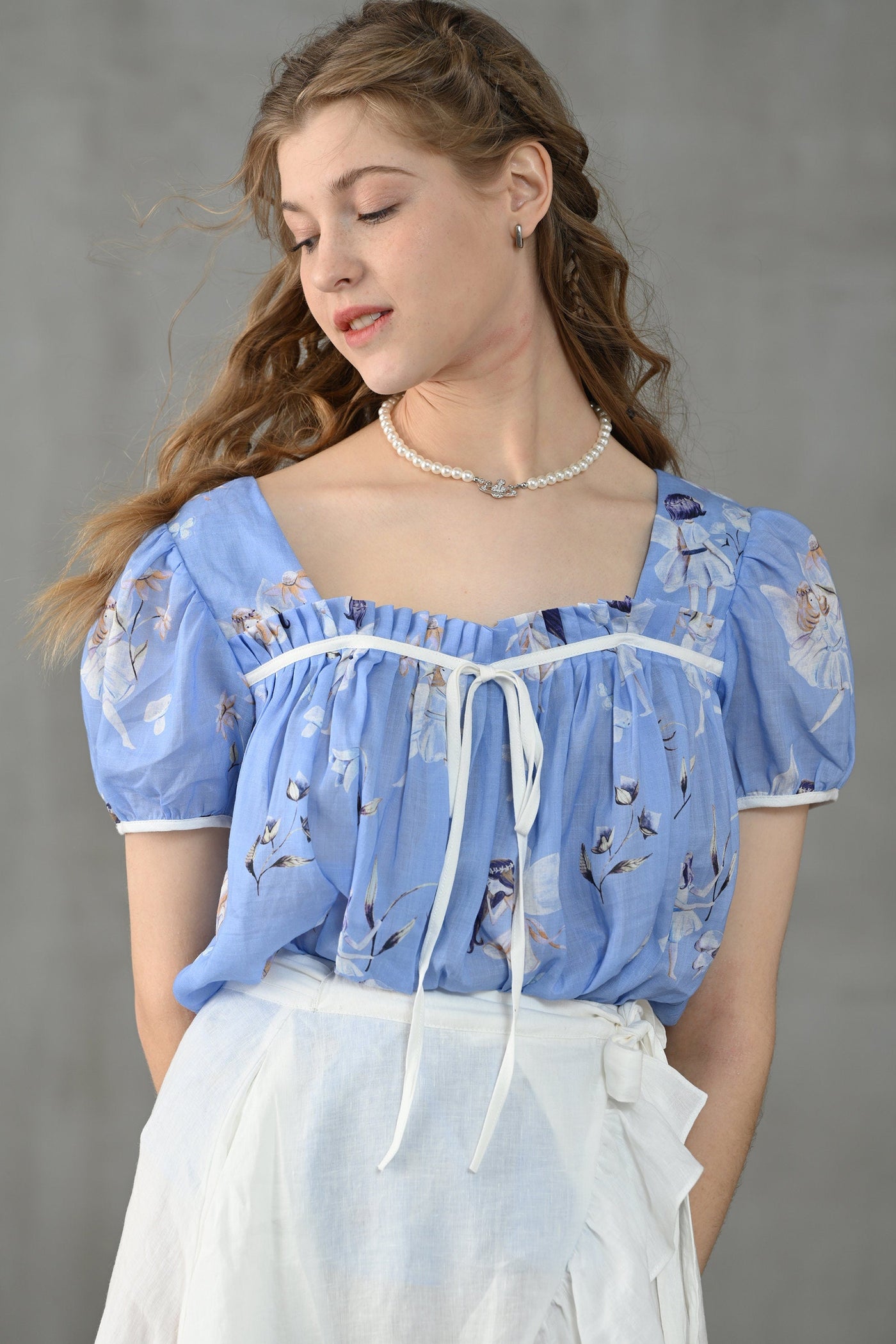 Daisy 33 | blue floral linen blouse